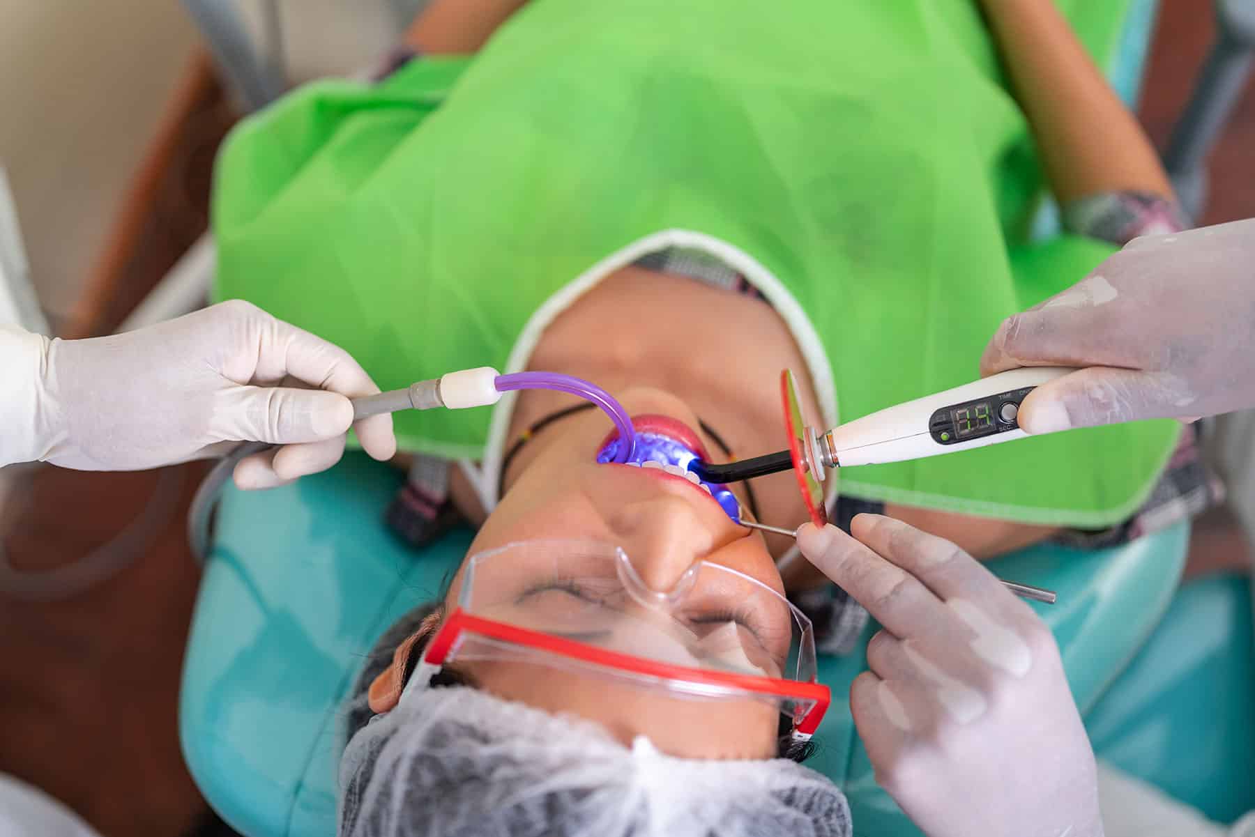 Woman getting dental treatment