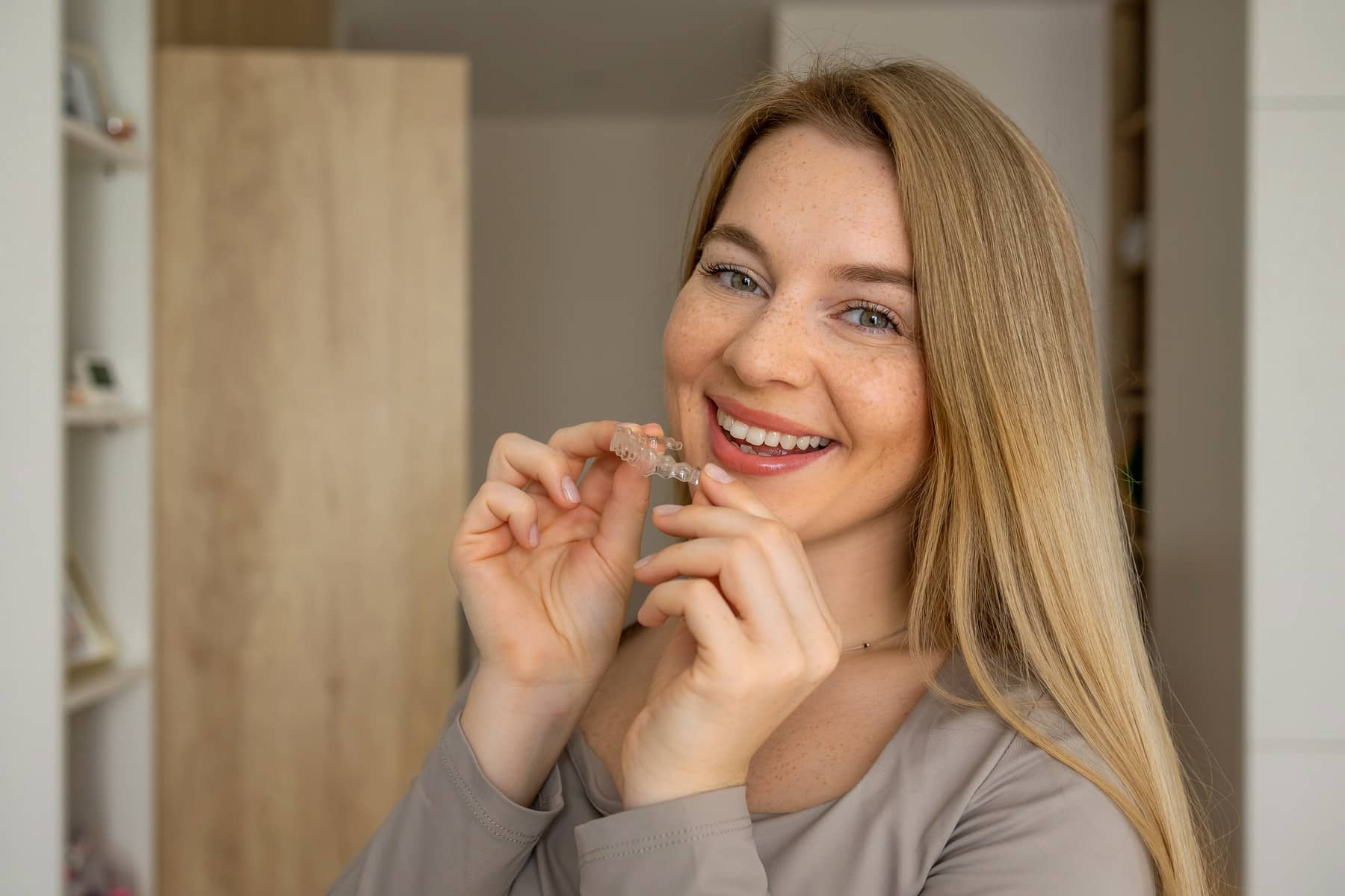 girl wearing her retainer after her orthodontic treatments from Northeast Orthodontics in Cinncinnati OH